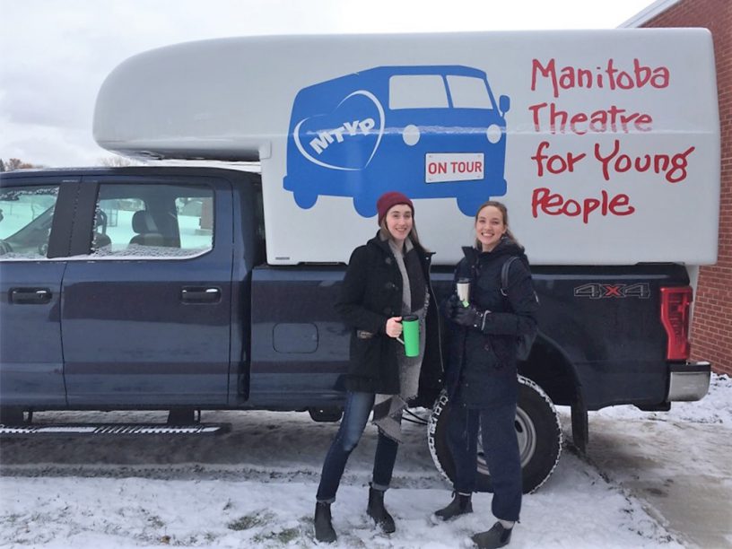 Stage Manager Katherine Johnston and Lisa Baran in front of touring van
